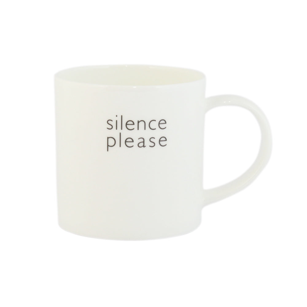 A white bone china mug with the text 'silence please' printed on it.