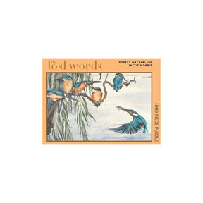 Jigsaw puzzle box with bird illustration and 'The Lost Words' text on a white background