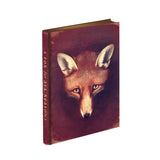 A hardback journal with a maroon cover featuring an illustration of a fox's face, titled 'A Fox of thebes' by Reynard the Fox author Anne Louise Avery.