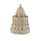 A beige plaster model of the Radcliffe Camera, a famous building in Oxford, England.