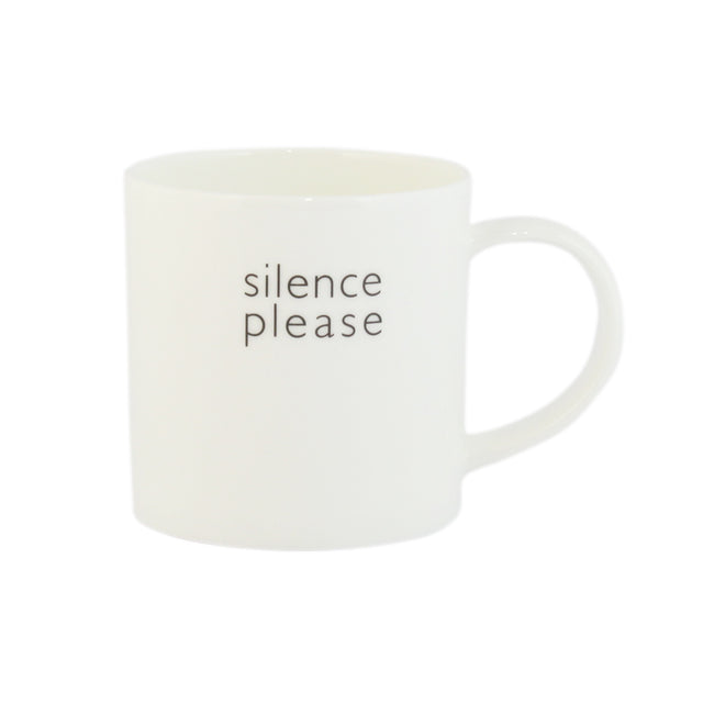 A white bone china mug with the text 'silence please' printed on it.